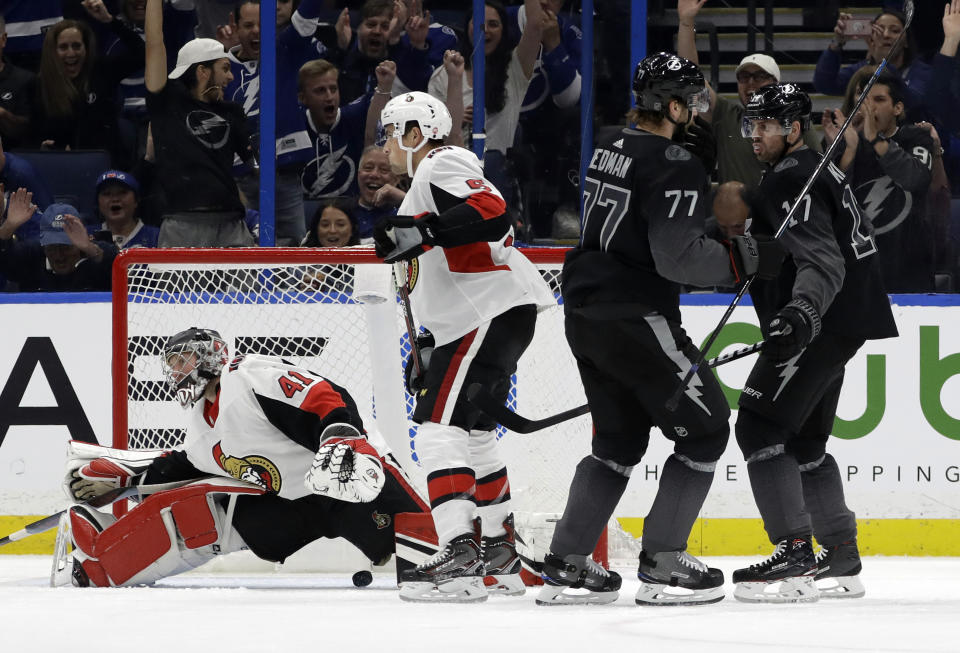 Tampa Bay Lightning defenseman Victor Hedman (77) celebrates his goal past Ottawa Senators goaltender Craig Anderson (41) with left wing Alex Killorn (17) during the first period of an NHL hockey game Saturday, March 2, 2019, in Tampa, Fla. (AP Photo/Chris O'Meara)