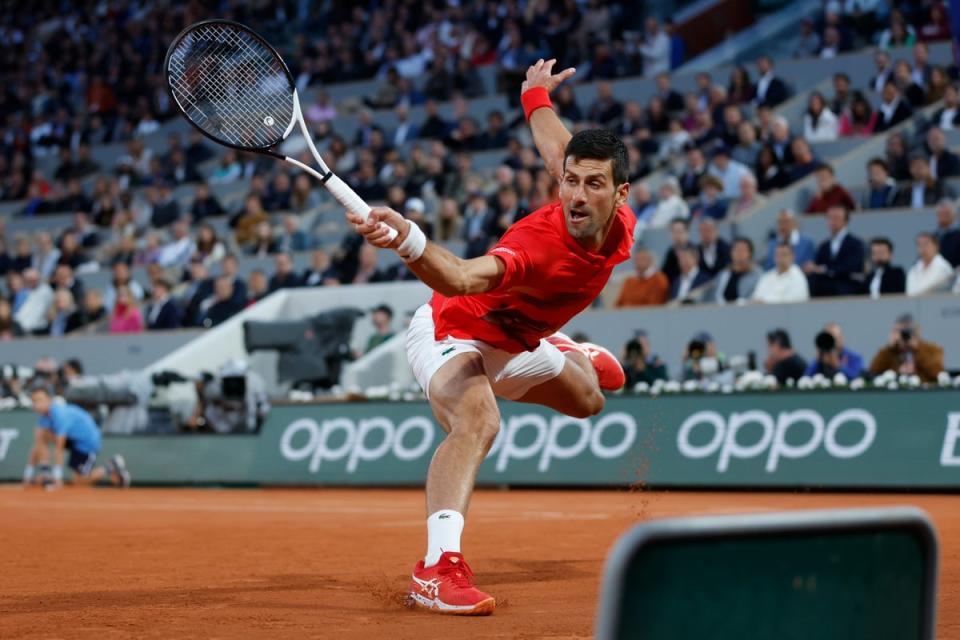 Djokovic at full stretch against Nadal (Jean-Francois Badias/AP) (AP)