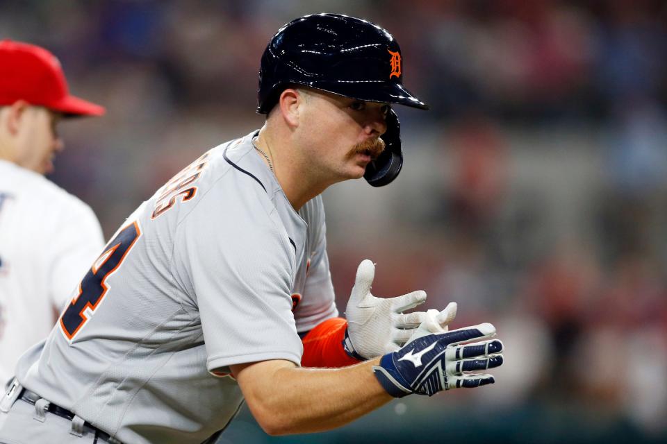 Tigers catcher Jake Rogers reacts after reaching third base in the seventh inning of the Tigers' 10-5 loss to the Rangers on Tuesday, July 6, 2021, in Arlington, Texas.