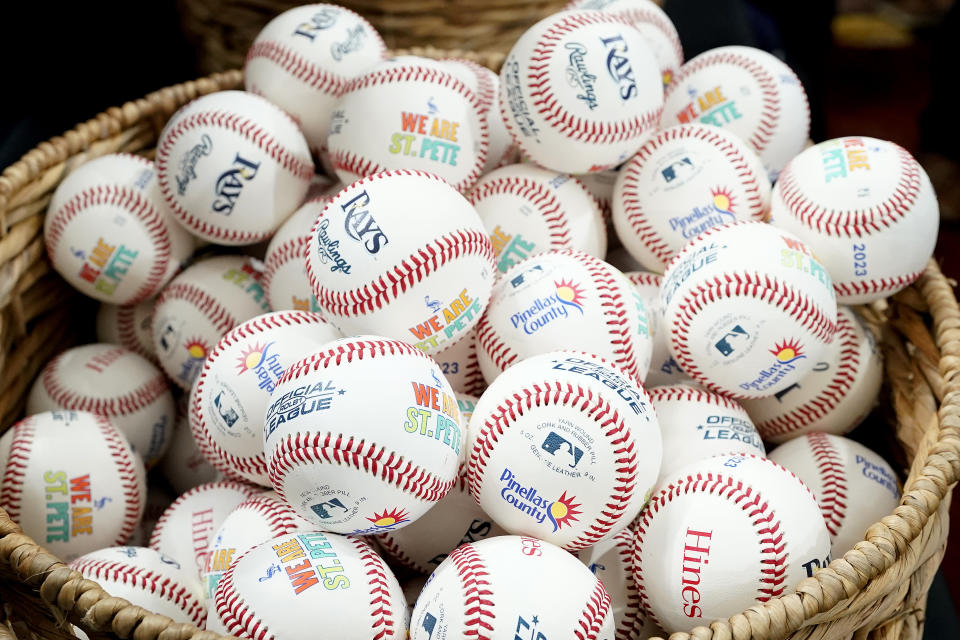 New commemorative baseballs are shown after the Tampa Bay Rays announced plans for a new stadium during a news conference Tuesday, Sept. 19, 2023, in St. Petersburg, Fla. (AP Photo/Chris O'Meara)