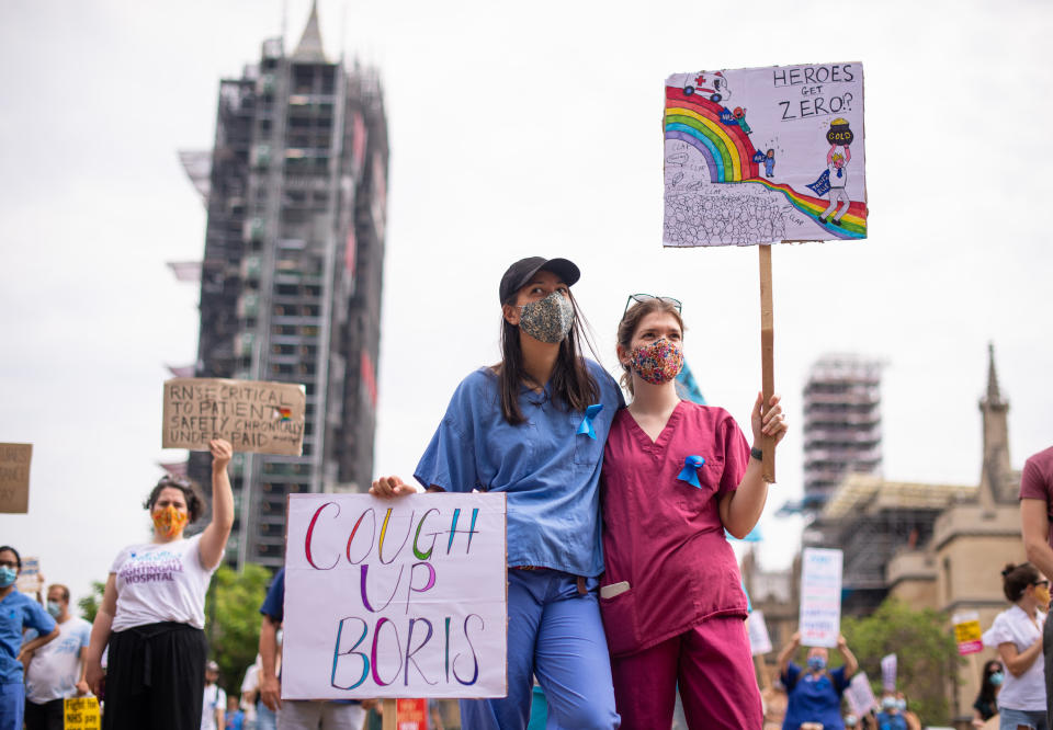 NHS workers at a rally in Parliament Square, London, as part of a national protest over pay. (Photo by Dominic Lipinski/PA Images via Getty Images)