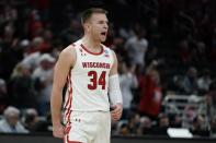 Wisconsin's Brad Davison reacts during the first half of a second-round NCAA college basketball tournament game against Iowa State Sunday, March 20, 2022, in Milwaukee. (AP Photo/Morry Gash)