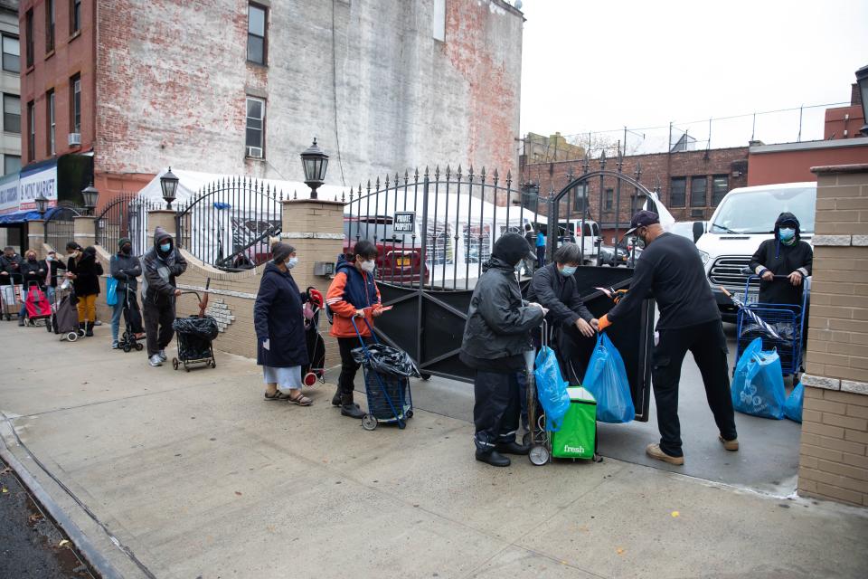 (201112) -- NEW YORK, Nov. 12, 2020 (Xinhua) -- People line up outside a food pantry in Brooklyn, New York, United States, on Nov. 12, 2020. The number of initial jobless claims in the United States fell to 709,000 last week, as the labor market continues to recover at a slowing pace, the Labor Department reported on Thursday. (Photo by Michael Nagle/Xinhua) (Xinhua/Michael Nagle/Wang Ying via Getty Images)