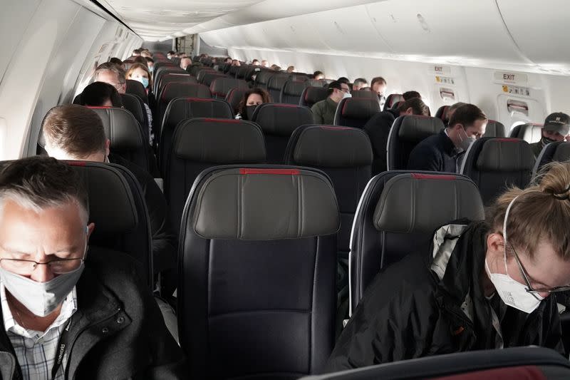 People fly on a media flight aboard a Boeing 737 Max airplane from Dallas Fort Worth Airport to Tulsa