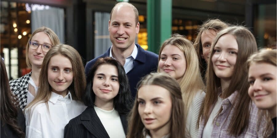 British Prince William takes a picture with Ukrainian refugees in Poland, March 23