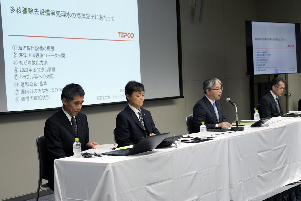 Junichi Matsumoto, second right, the corporate officer in charge of treated water management for Tokyo Electric Power Co. (TEPCO) Holdings, which operates the Fukushima No. 1 nuclear power plant, speaks during a press conference at TEPCO headquarter building Tuesday, Aug. 22, 2023, in Tokyo. (AP Photo/Eugene Hoshiko)