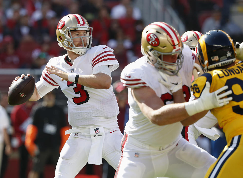 San Francisco 49ers quarterback C.J. Beathard (3) passes against the Los Angeles Rams during the first half of an NFL football game in Santa Clara, Calif., Sunday, Oct. 21, 2018. (AP Photo/Tony Avelar)