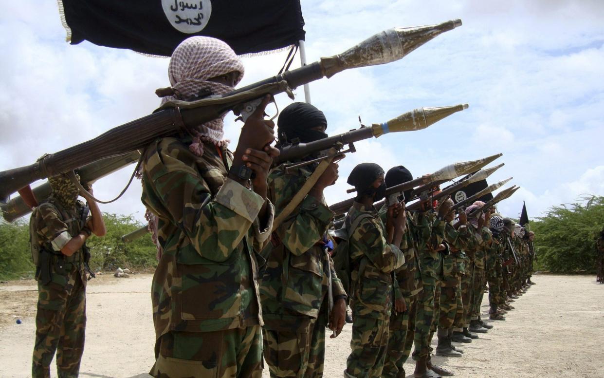 File photo of Al Shabaab militants parading new recruits after arriving in Mogadishu - REUTERS