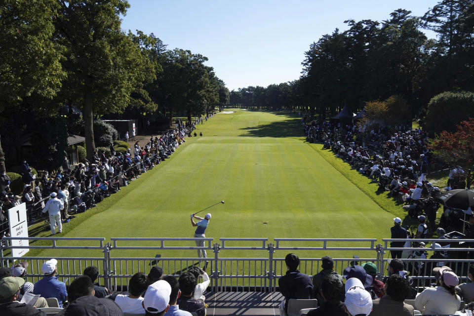 Spectators watch a tee shot on the first hall during the third round of the Zozo Championship golf tournament at Accordia Golf Narashino Country Club on Saturday, Oct. 23, 2021 in Inzai, Chiba Prefecture, Japan. (AP Photo/Tomohiro Ohsumi)