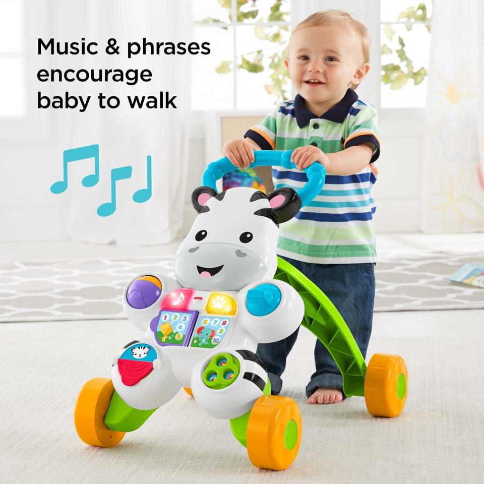 toddler pushing walker