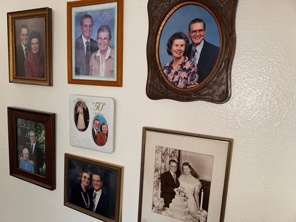 A wall full of memories is on display at Dr. Marvin Lee Lykins Oakmont of Brookside apartment on Jan. 25, 2024.