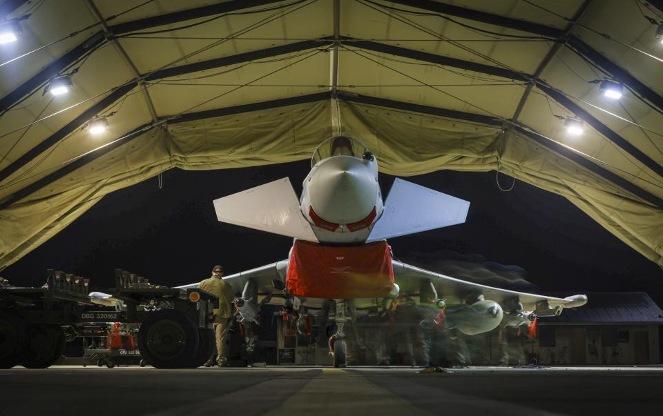 a Royal Air Force Typhoon FGR4 is prepared for take off to carry out air strikes against Houthi military targets in Yemen