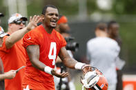 Cleveland Browns quarterback Deshaun Watson reacts to a play during an NFL football practice at the team's training facility Wednesday, May 25, 2022, in Berea, Ohio. (AP Photo/Ron Schwane)