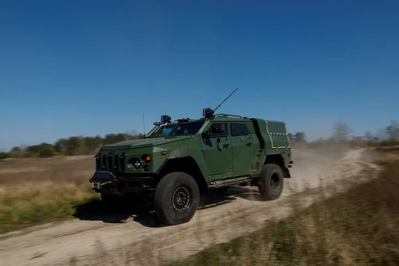 Employee tests a Novator armoured personnel carrier at a testing facility of the 'Ukrainian Armor' company in Ukraine