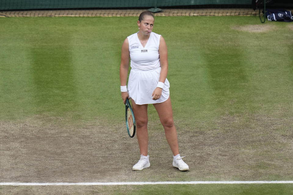 Jelena Ostapenko of Latvia reacts during her quarterfinal match against Barbora Krejcikova of the Czech Republic at the Wimbledon tennis championships in London, Wednesday, July 10, 2024. (AP Photo/Alberto Pezzali)