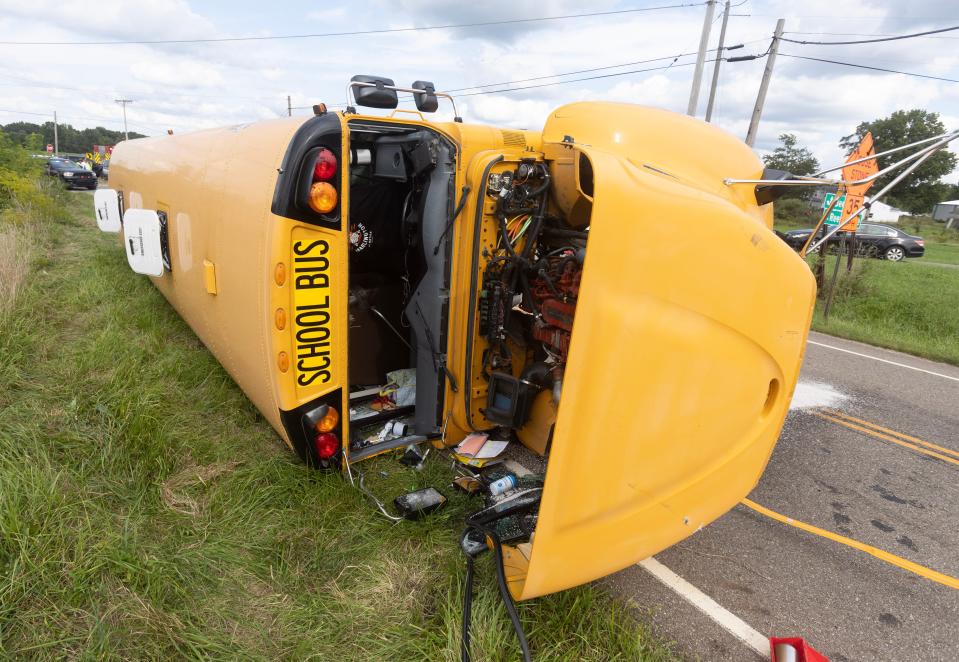 A Marlington Local school bus carrying 19 students home overturned Monday afternoon in Marlboro Township. The driver and some students received minor injuries, police said.