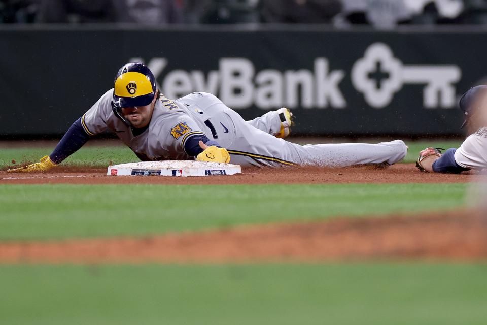 Brewers centerfielder Garrett Mitchell steals third base during the 10th inning against the Seattle Mariners Tuesday, April 18, 2023, at T-Mobile Park in Seattle. He suffered a shoulder injury and later left the game.