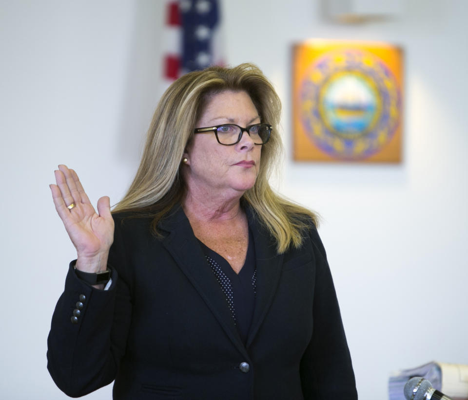 Private Investigator Rebecca Dixon is sworn in as a witness during an evidentiary hearing at Merrimack County Superior Court in Concord, N.H., Wednesday, Feb. 22, 2017, on whether Owen Labrie should be granted a retrial. Labrie, a prep school graduate convicted of using a computer to lure an underage girl for sex, returned to court for a hearing on whether his lawyers damaged his case. (Geoff Forester/The Concord Monitor via AP, Pool)