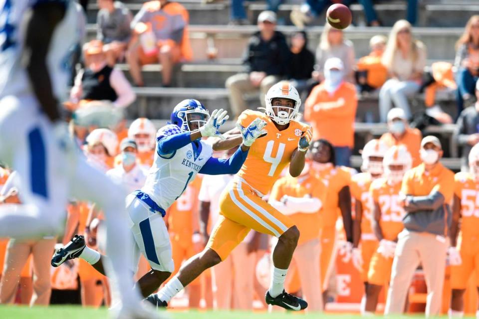 Kelvin Joseph (1) intercepts a ball intended for Tennessee wide receiver Cedric Tillman (4) and runs it back for a touchdown in a 34-7 Kentucky win at Tennessee in 2020.