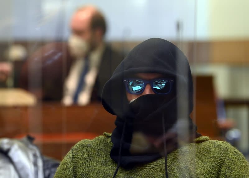 A co-defendant waits for the verdict in the trial of German sports doctor Mark S. (not pictured), accused of masterminding an international doping network in cycling and winter sports, at the Regional Court (Landgericht) in Munich