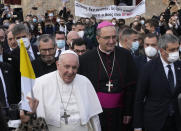 Pope Francis arrives for a meeting with young people at the Saint Dionysius School of the Ursuline Sisters in Athens, Greece, Monday, Dec. 6, 2021. Francis' five-day trip to Cyprus and Greece has been dominated by the migrant issue and Francis' call for European countries to stop building walls, stoking fears and shutting out "those in greater need who knock at our door." (AP Photo/Alessandra Tarantino)