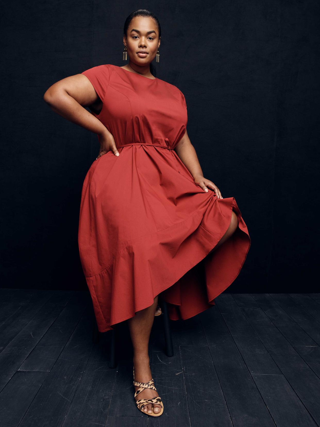 Model wears a red dress from the new size-inclusive J.Crew collection with Universal Standard. (Photo: courtesy of J.Crew)