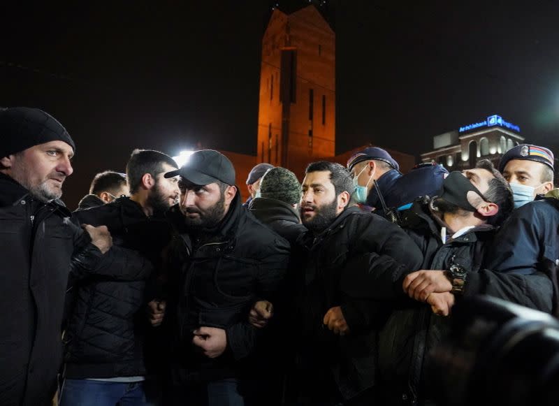 People attend an opposition rally in Yerevan