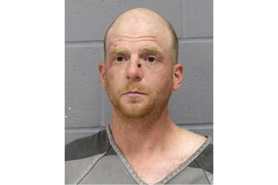 This booking photo released by the Austin, Texas, Police Department shows Bert James Baker, 36, who was arrested following a Sunday evening, Feb. 4, 2024, attack on Zacharia Doar, who was hospitalized. Baker was charged with aggravated assault with a deadly weapon. Police said Wednesday, Feb. 7, 2024, that their Hate Crimes Review Committee had determined that the stabbing met the definition of a hate crime. (Austin Police Department via AP)