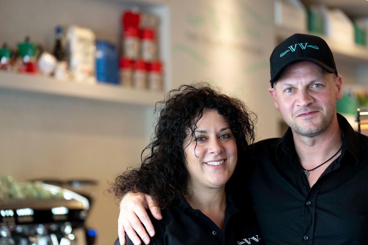 Melissa De Giorgi and her husband, Andrea Stafano, the Italian Experience and VV Just Italian owners, stand inside the Italian Experience in Mount Lookout.