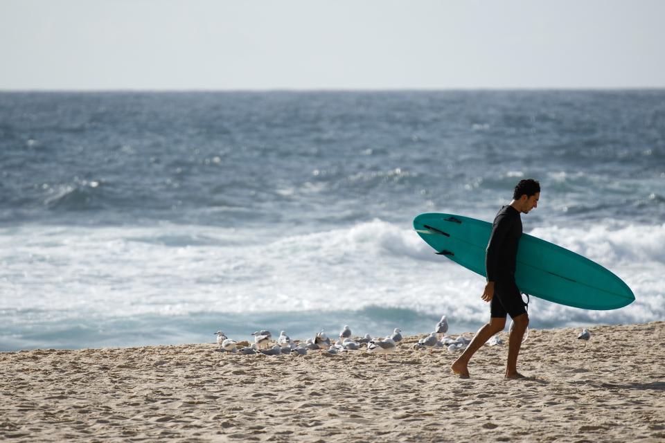 <p>File image: The foot was discovered on a beach over 400 kilometres away from Sydney    </p> (EPA)