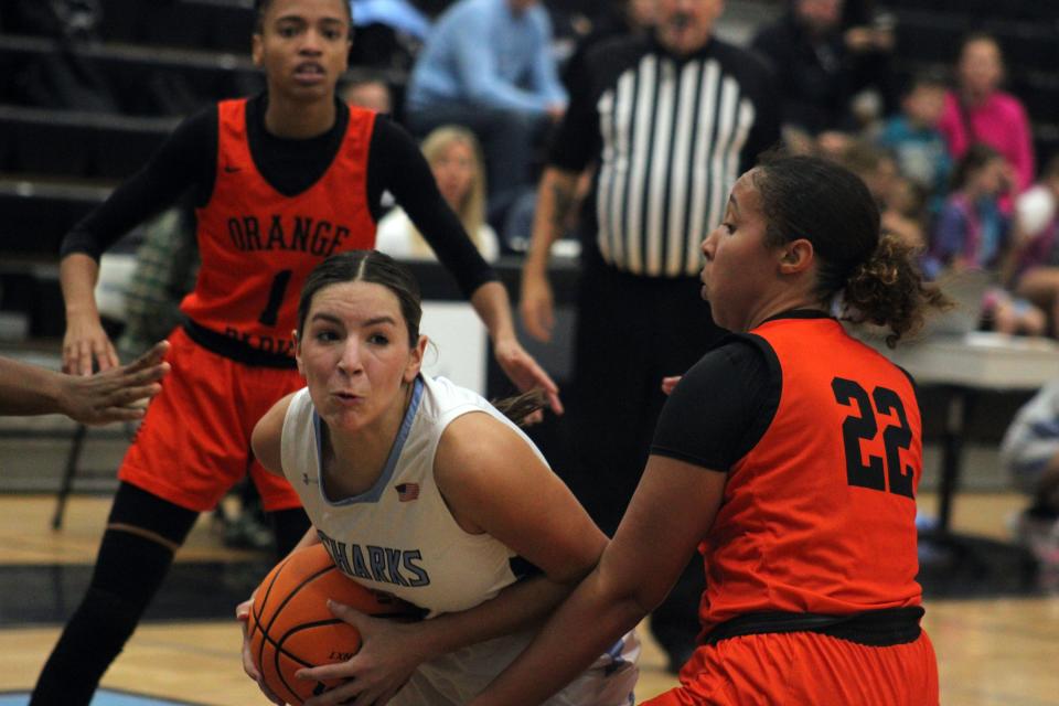 Ponte Vedra forward Maya Richards (2) tries to battle to the basket as Orange Park's Autumn Nesmith (1) and Alanna Kennedy (22) defend during a Jan. 18 game.