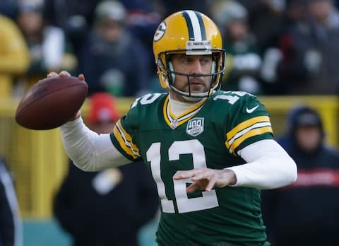 Green Bay Packers' Aaron Rodgers throws during the first half of an NFL football game against the Atlanta Falcons - Credit: AP Photo/Mike Roemer