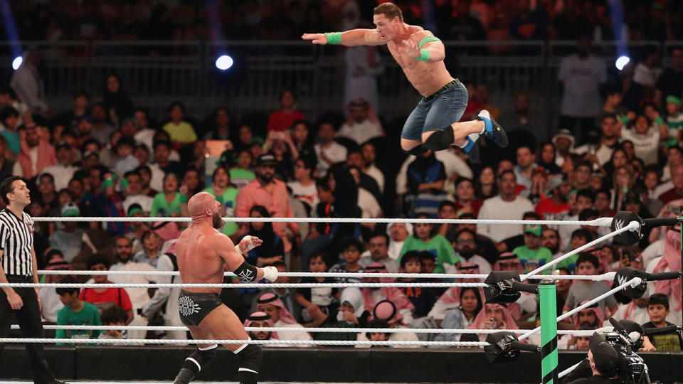 John Cena (R) competes with Triple H during the WWE Greatest Royal Rumble event in Saudi Arabia. (Photo by STRINGER / AFP)