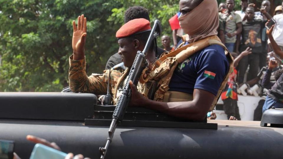 Burkina Faso's couple leader Ibrahim Traoré waves as he arrives in an armoured vehicle in Ouagadougou, Burkina Faso - 2 October 2022