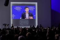 OpenAI CEO Sam Altman participates in the "Technology in a turbulent world" panel discussion during the annual meeting of the World Economic Forum in Davos, Switzerland, Thursday, Jan. 18, 2024. The annual meeting of the World Economic Forum is taking place in Davos from Jan. 15 until Jan. 19, 2024. (AP Photo/Markus Schreiber)