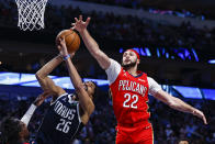 Dallas Mavericks guard Spencer Dinwiddie (26) attempts to shoot as New Orleans Pelicans forward Larry Nance Jr. (22) defends during the second half of an NBA basketball game, Thursday, Feb. 2, 2023, in Dallas. (AP Photo/Brandon Wade)