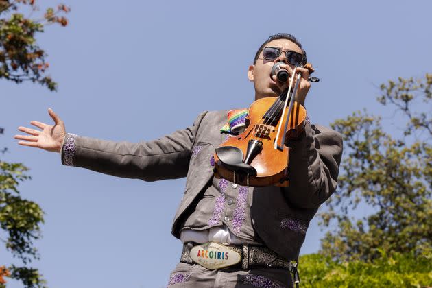 Carlos Samaniego, founder of Mariachi Arcoiris, an L.A. based group and the world's first all-LGBTQ mariachi band, performs at the Long Beach Proud Festival in Los Angeles on May 20, 2023.