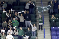 Boston fans celebrate a tying goal by forward Hannah Brandt against Montreal during the third period of a PWHL playoff hockey game Tuesday, May 14, 2024, in Lowell, Mass. (AP Photo/Mark Stockwell)