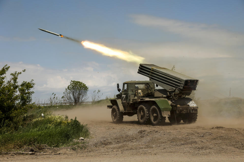 A Donetsk People's Republic militia's multiple rocket launcher fires from its position not far from Panteleimonivka, in territory under the government of the Donetsk People's Republic, eastern Ukraine, on May 28, 2022. (Alexei Alexandrov / AP)