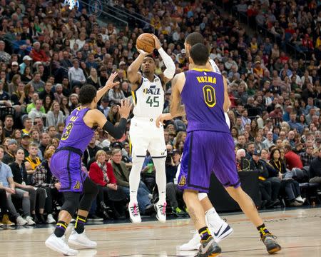 Jan 11, 2019; Salt Lake City, UT, USA; Utah Jazz guard Donovan Mitchell (45) shoots the ball against Los Angeles Lakers guard Josh Hart (3) during the second half at Vivint Smart Home Arena. Mandatory Credit: Russ Isabella-USA TODAY Sports