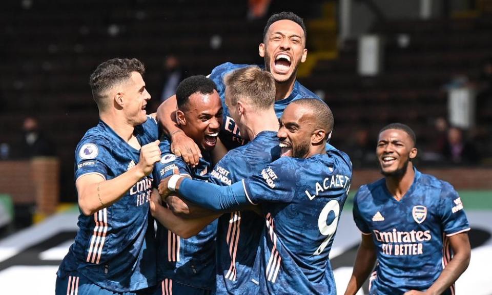 Gabriel Magalhaes (second left) is mobbed after doubling Arsenal’s lead.