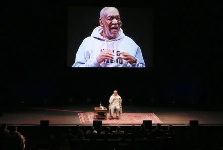 Comedian Bill Cosby performs at The Temple Buell Theatre in Denver, Colorado January 17, 2015. REUTERS/Barry Gutierrez