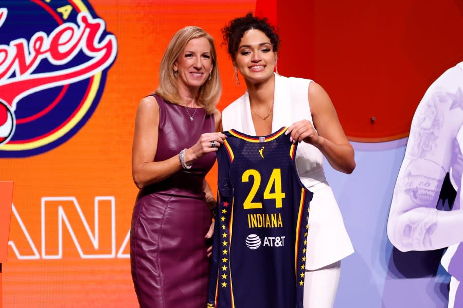 NEW YORK, NEW YORK – APRIL 15: Celeste Taylor (R) poses with WNBA Commissioner Cathy Engelbert (L) after being selected 15th overall pick by the Indiana Fever during the 2024 WNBA Draft at Brooklyn Academy of Music on April 15, 2024 in New York City. (Photo by Sarah Stier/Getty Images)
