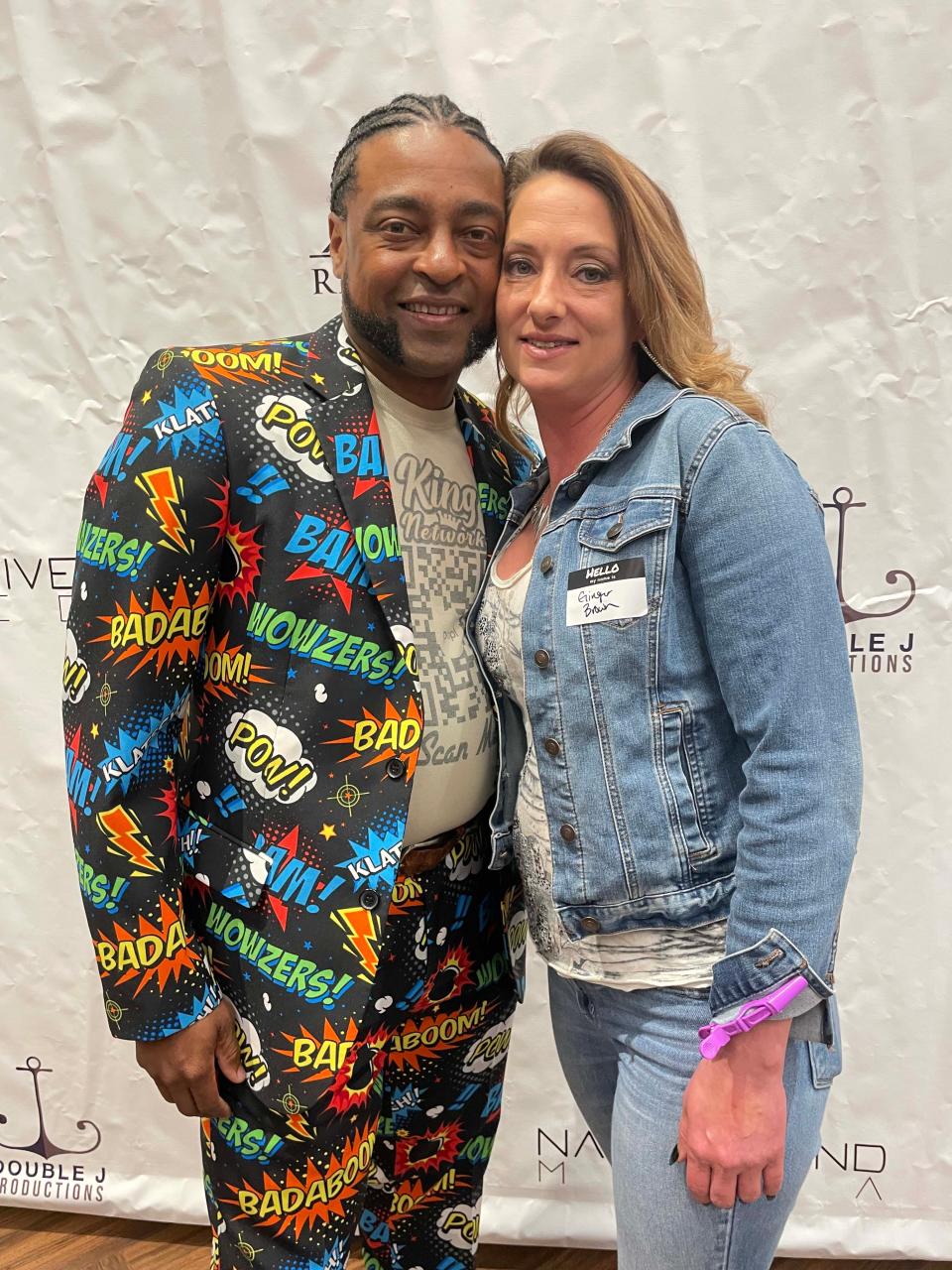 Lee-Lee Williams of The Crossroads, with date Ginger Brown, throws a one-two punch with his colorful suit at the TN Actors Networking group mixer held at the Farragut Community Center Tuesday, March 29, 2022.