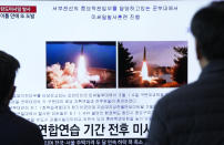 FILE - A TV screen shows file images of North Korea's missiles launch during a news program at the Seoul Railway Station in Seoul, South Korea, March 16, 2023. (AP Photo/Ahn Young-joon, File)