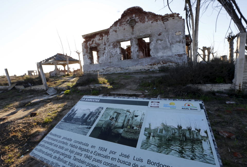 A ruined house is pictured in the onetime spa and resort town of Epecuen, November 6, 2015.  Over the past few years the town of Epecuen, located 550 km (341 miles) southwest of Buenos Aires, has been attracting tourists with its eerie apocalyptic atmosphere after a flood submerged it in salt water for more than two decades. Originally a busy lakeside tourist village in the 1920s renowned for its saltwater baths, Epecuen came to a sudden end in November 10, 1985 when a succession of rainy winters caused Lago Epecuen to overflow and water surged through a special retaining wall and into the town. Residents and tourists were forced to evacuate and in just a few days homes and buildings were covered by almost 10 meters (33 feet) of salt water. Now, 30 years on, the water has evaporated and former residents can walk amidst the rusted out ruins of what was once their town. Picture taken November 6, 2015. REUTERS/Enrique Marcarian