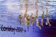 Spain's Irene Montruchhio Beuas, Spain's Paula Klamburg Roque, Spain's Andrea Fuentes Fache, Spain's Margalida Crespi Jaume, Spain's Clara Basiana Canellas, Spain's Ona Carbonell Ballestero, Spain's Alba Cabello Rodilla and Spain's Thais Henriquez Torres compete in the team free routine final in the synchronised swimming competition at the London 2012 Olympic Games on August 10, 2012 in London