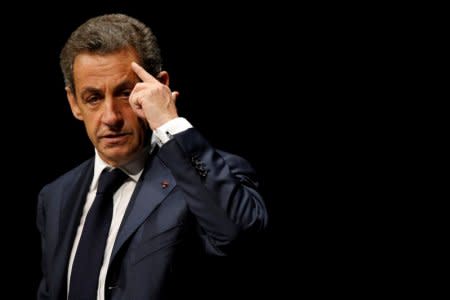FILE PHOTO: Nicolas Sarkozy, former head of the Les Republicains political party, attends a Les Republicains (LR) public meeting in Les Sables d'Olonne, France, October 1, 2016. REUTERS/Stephane Mahe/File Photo