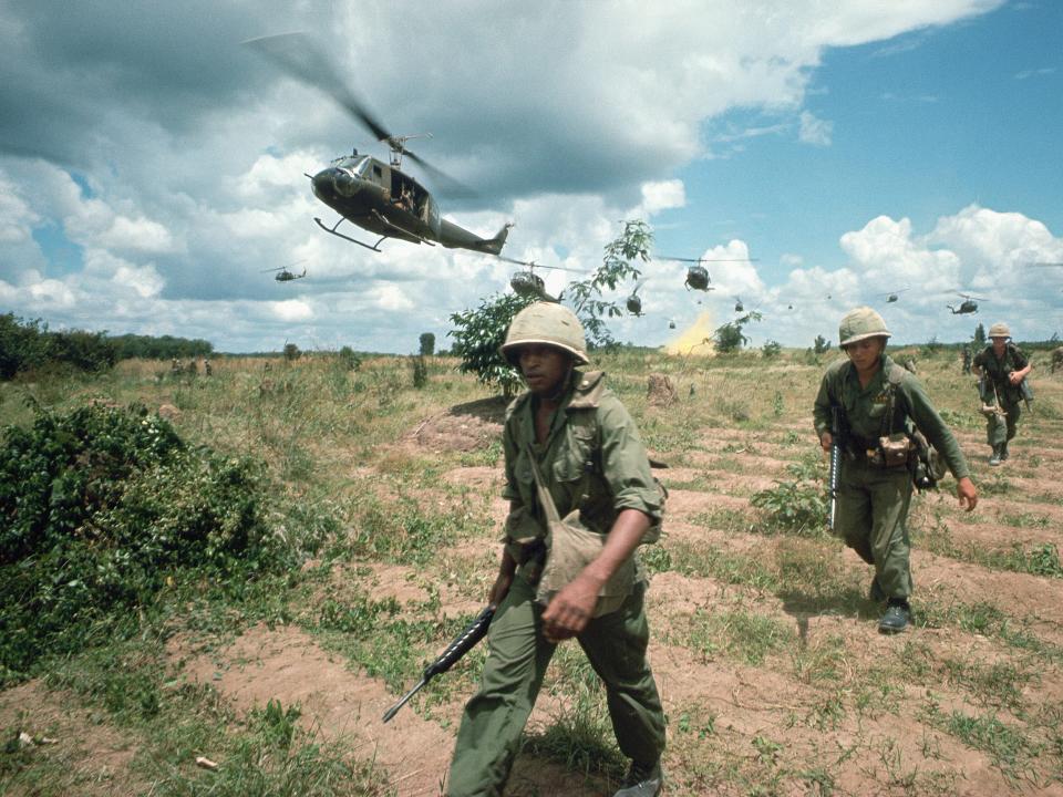 The US 173rd Airborne are supported by helicopters during the Iron Triangle assault in Vietnam.