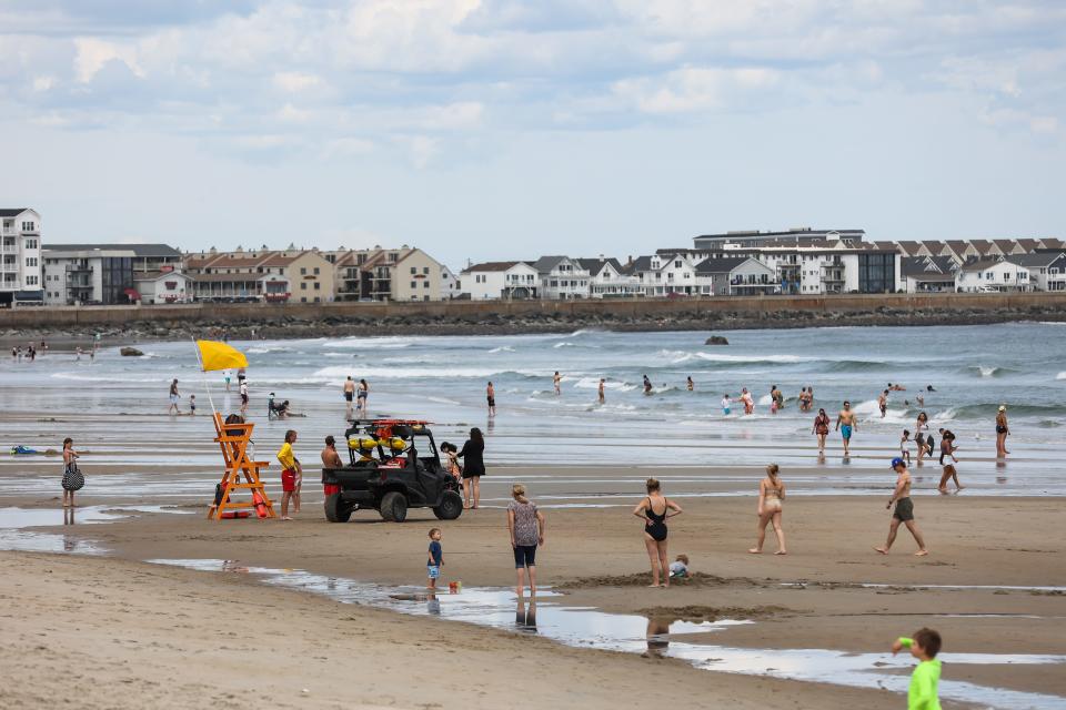 Lifeguards patrol Hampton Beach on Saturday, June 11, 2022.